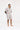 Side view of man in Sesame Street™ comic print PJ set
