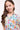 Close-up of girl smiling in Sesame Street™ comic print PJ top