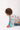 Baby crawling away in Sesame Street™ comic print onesie