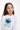 Close-up of girl in Cookie Monster 'Me Want Cookie!' top